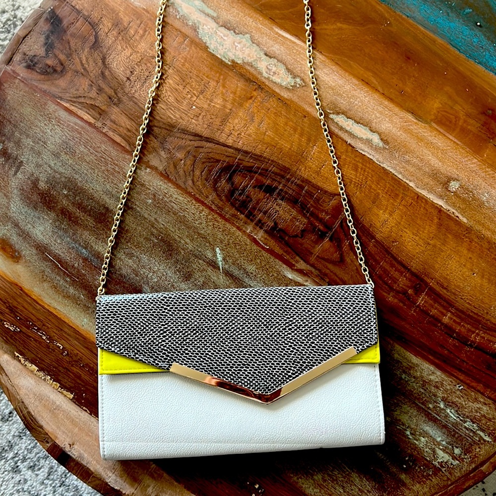 White black and yellow crossbody bag. Gently used and non smoking home.